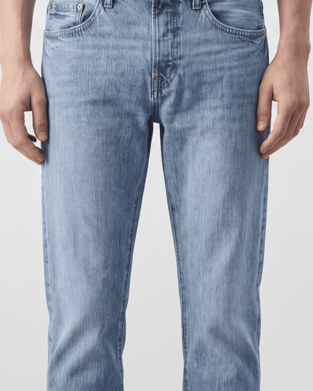 Close-up front waist detail of Sama Denim men's light wash straight fit jeans